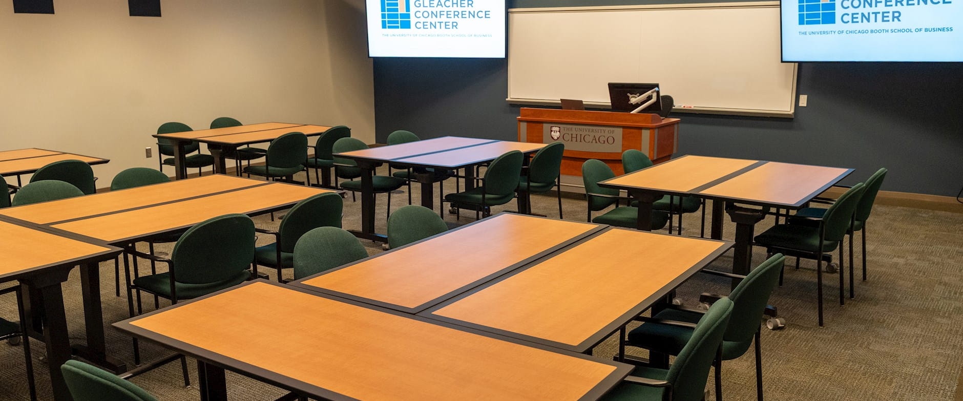 Executive Meeting Room arrangement with tables in groups.